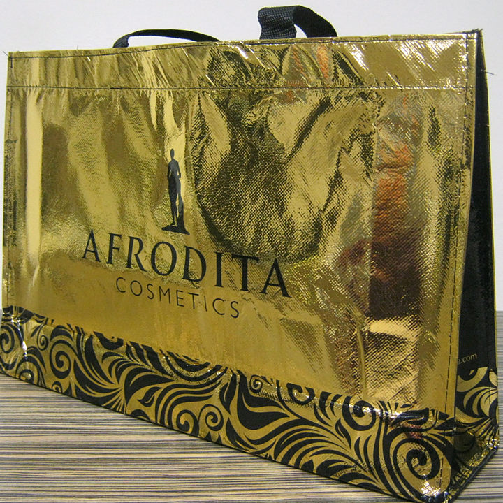 Zlata nakupovalna vrečka z logotipom Afrodita Cosmetics